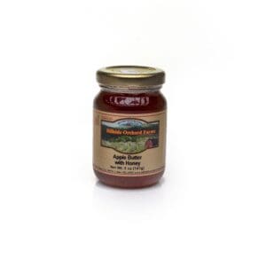 Jar of apple butter with honey